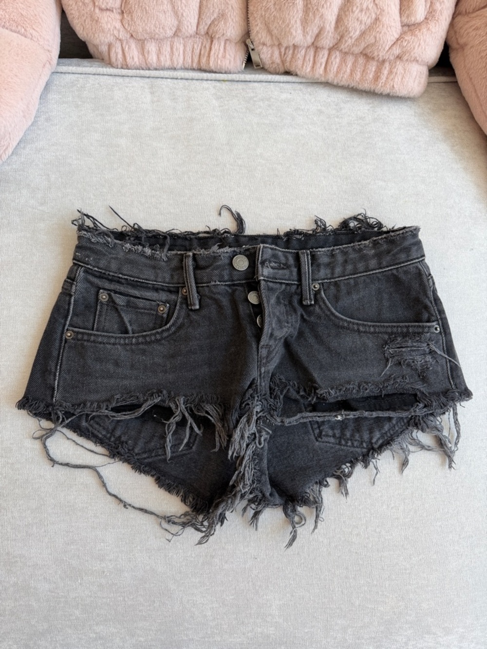 Low-Rise Black Distressed Denim Shorts